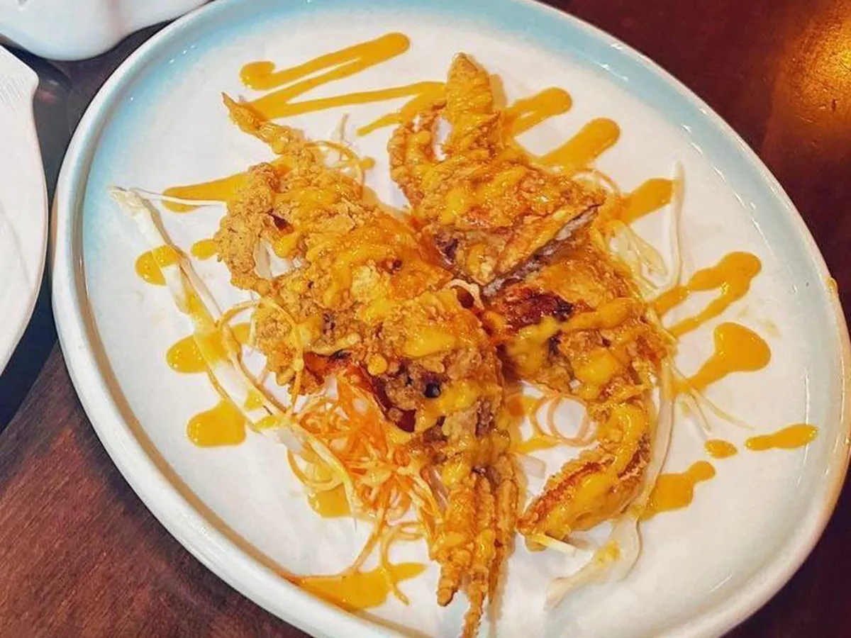 Crispy fried soft-shell crab with creamy orange sauce at Sushi Mizu, a Japanese Restaurant in New Iberia