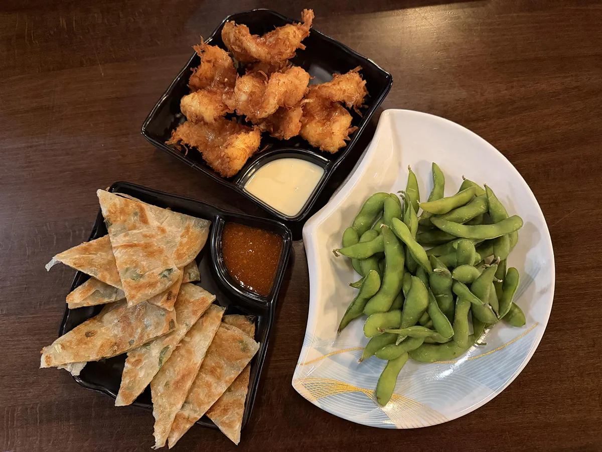 Appetizer platter with tempura shrimp, scallion pancake and edamame at Sushi Mizu, a Japanese Restaurant in New Iberia